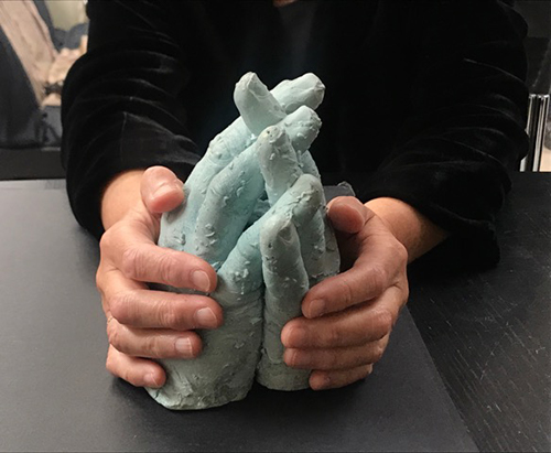 These two large hands were linked and show remarkable detail. Dye was placed in the hot wax as an extra control.